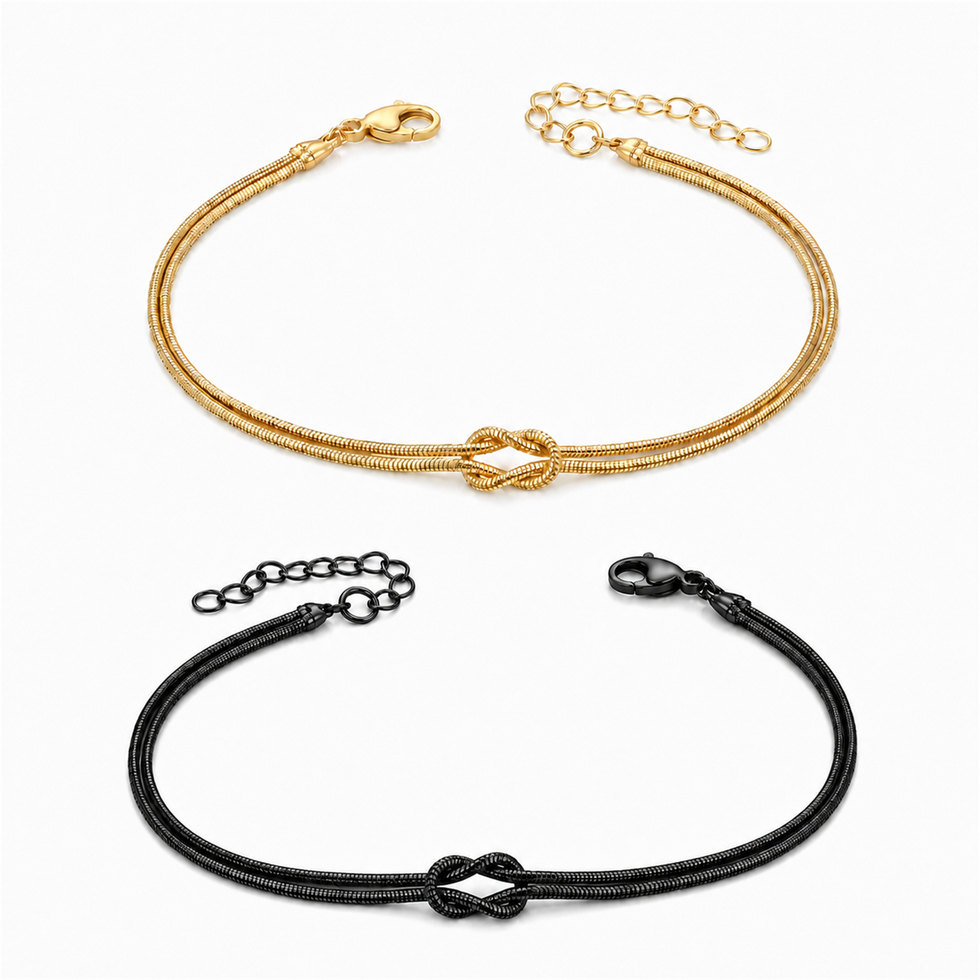 Knot Armband-Set Gold und Schwarz auf weißem Hintergrund