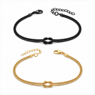 Knot Armband-Set Schwarz oben und Gold unten auf weißem Hintergrund