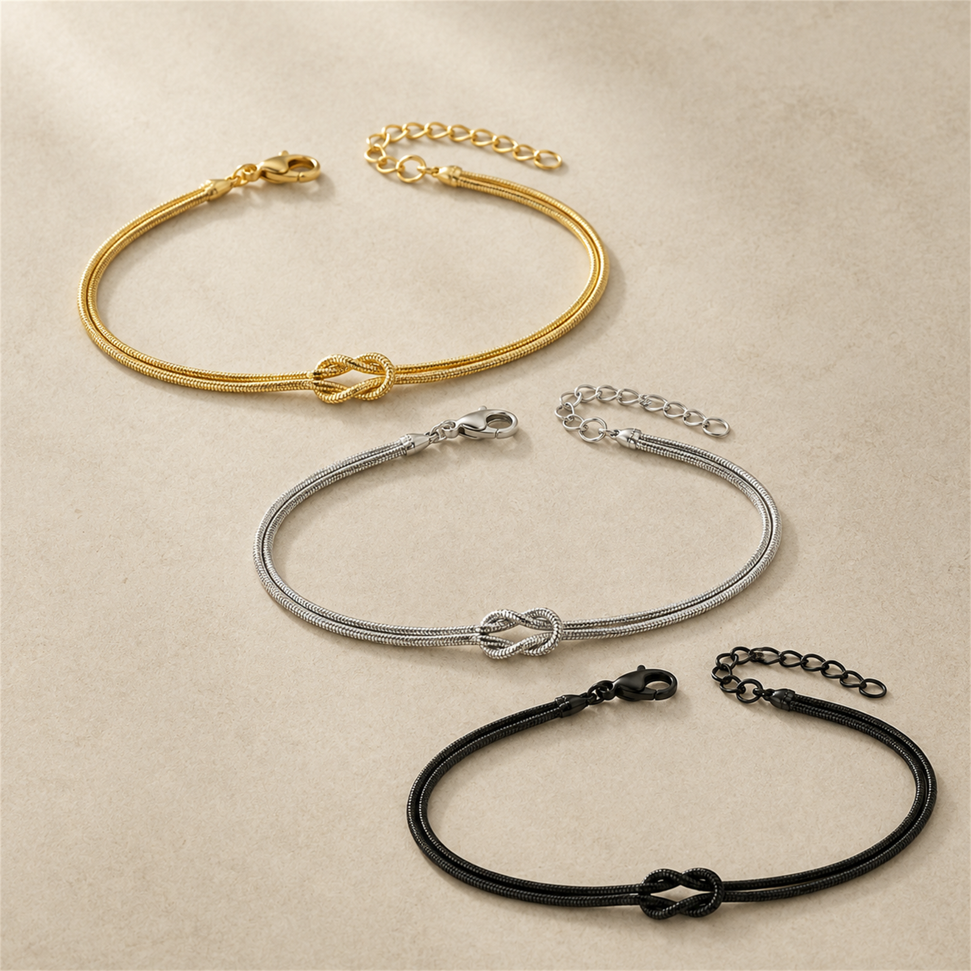 Knotenarmband in Gold Silber und Schwarz all-groups